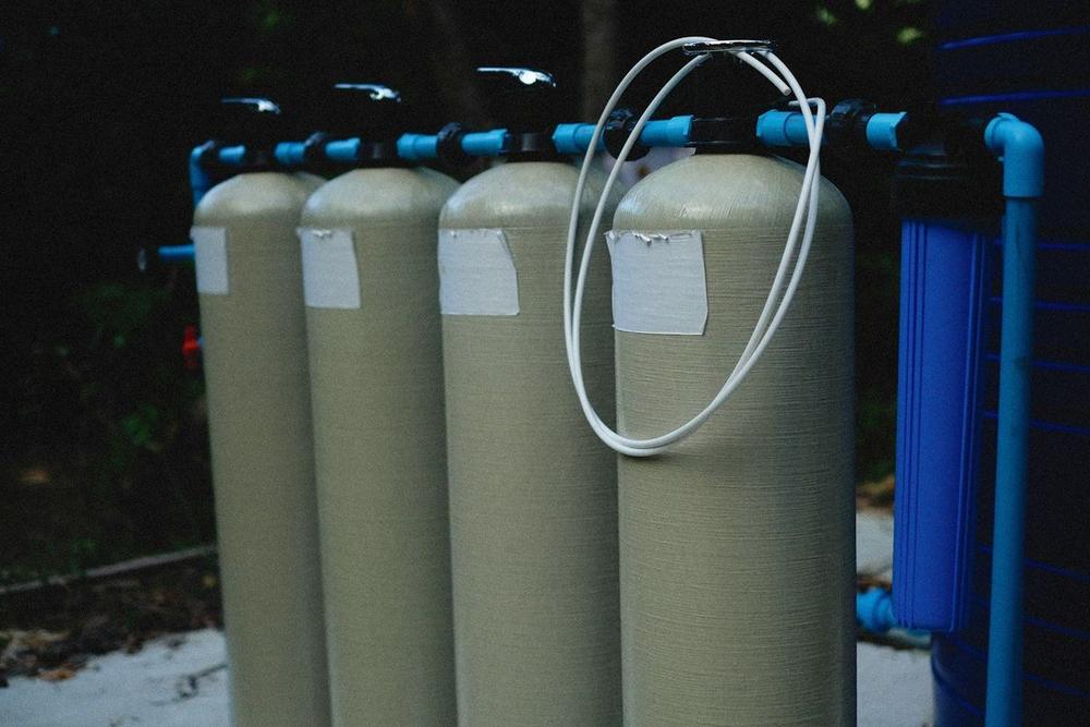 Row of FRP pressure vessels on a water treatment skid