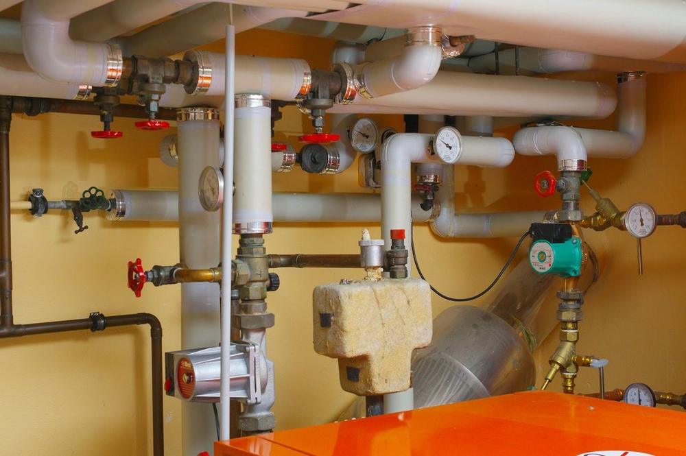 Plant room pipework with valves and gauges